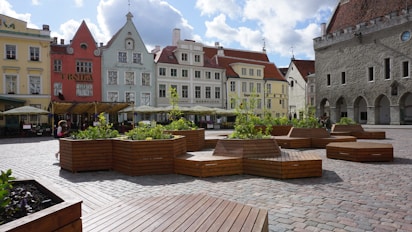 A group of wooden benches sitting next to each other