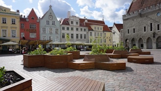 A group of wooden benches sitting next to each other