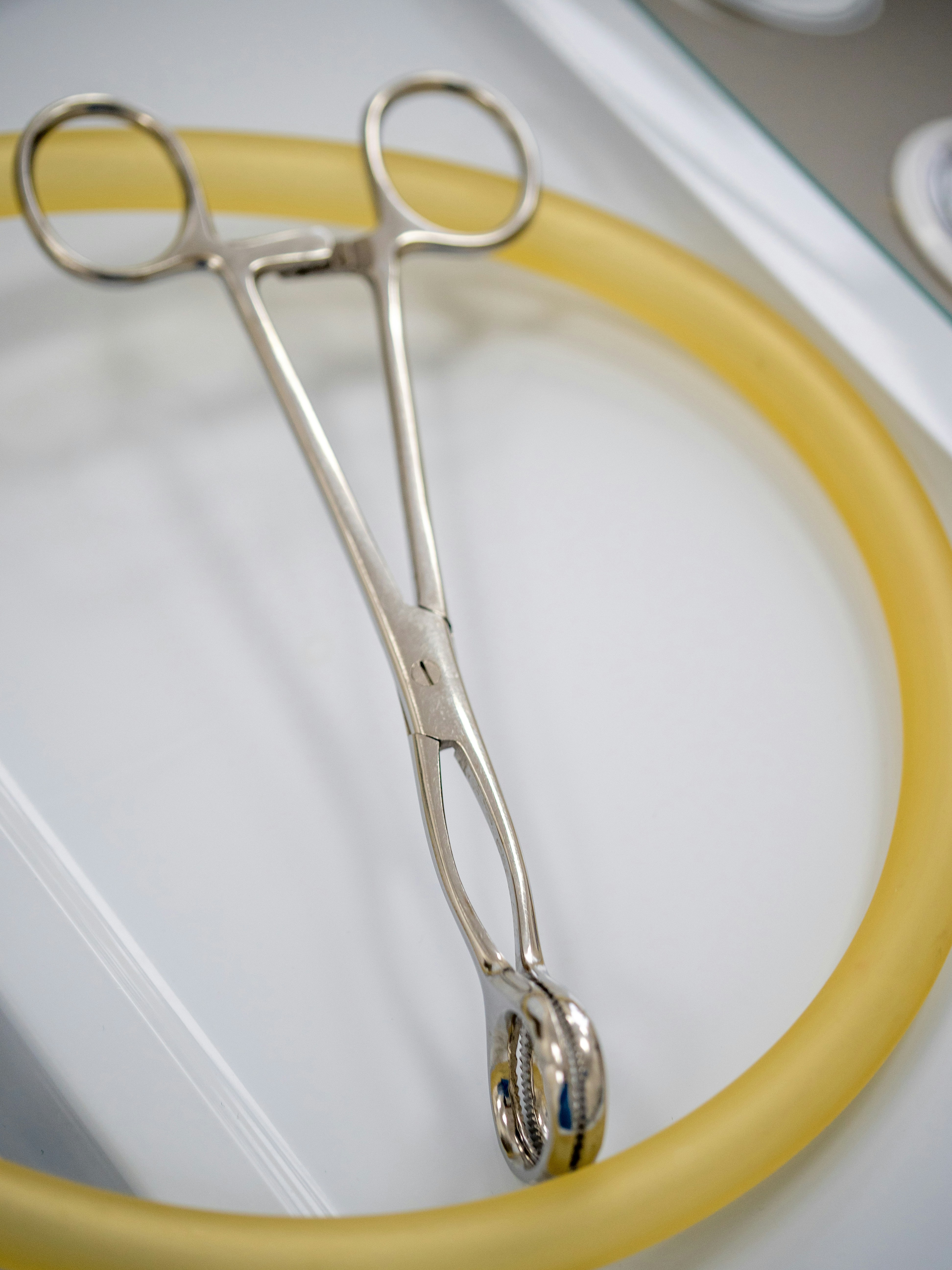 A pair of scissors sitting on top of a table