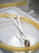 A pair of scissors sitting on top of a table