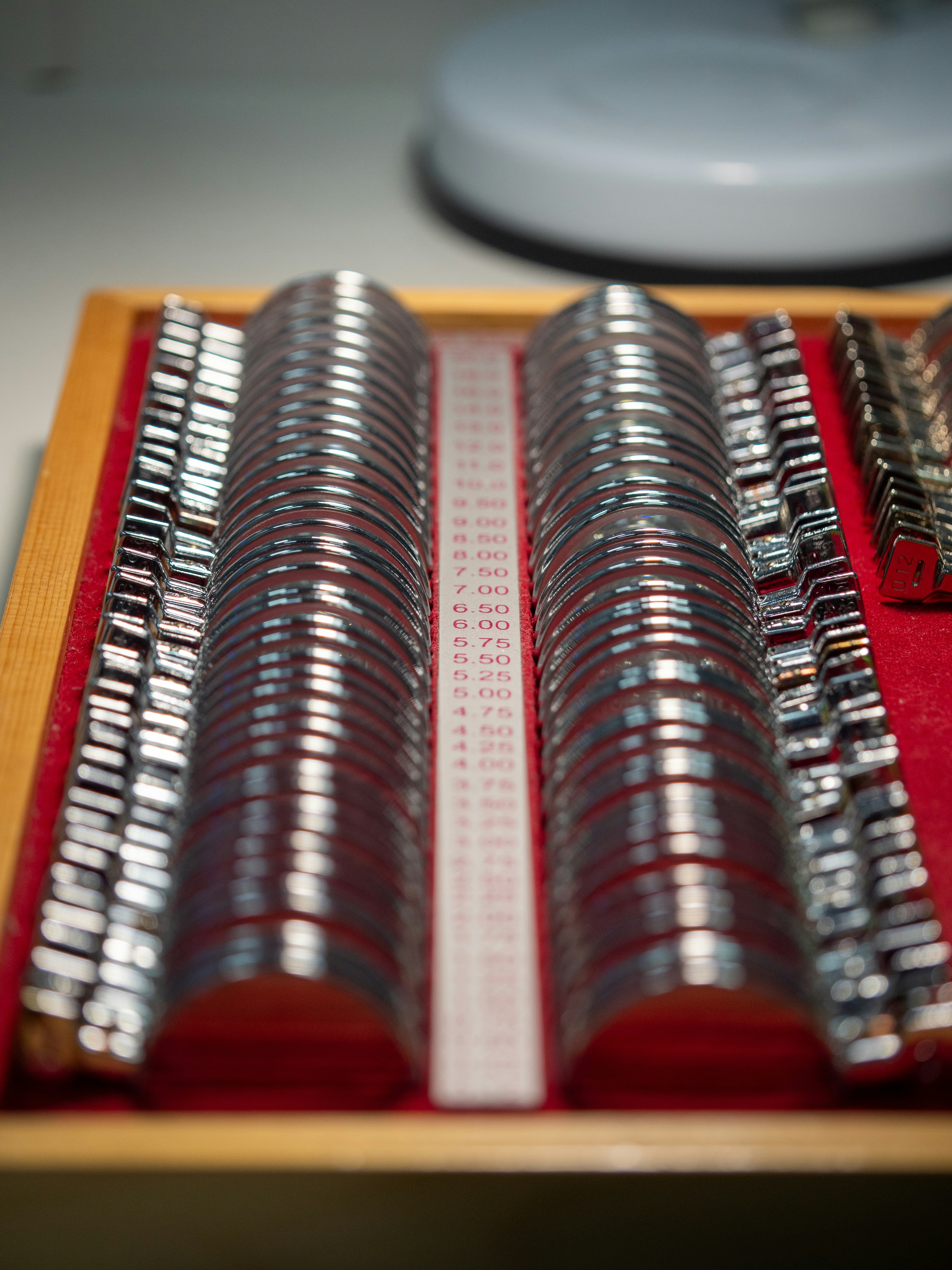 A close up of a set of metal objects in a box