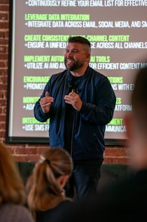 A man standing in front of a crowd of people
