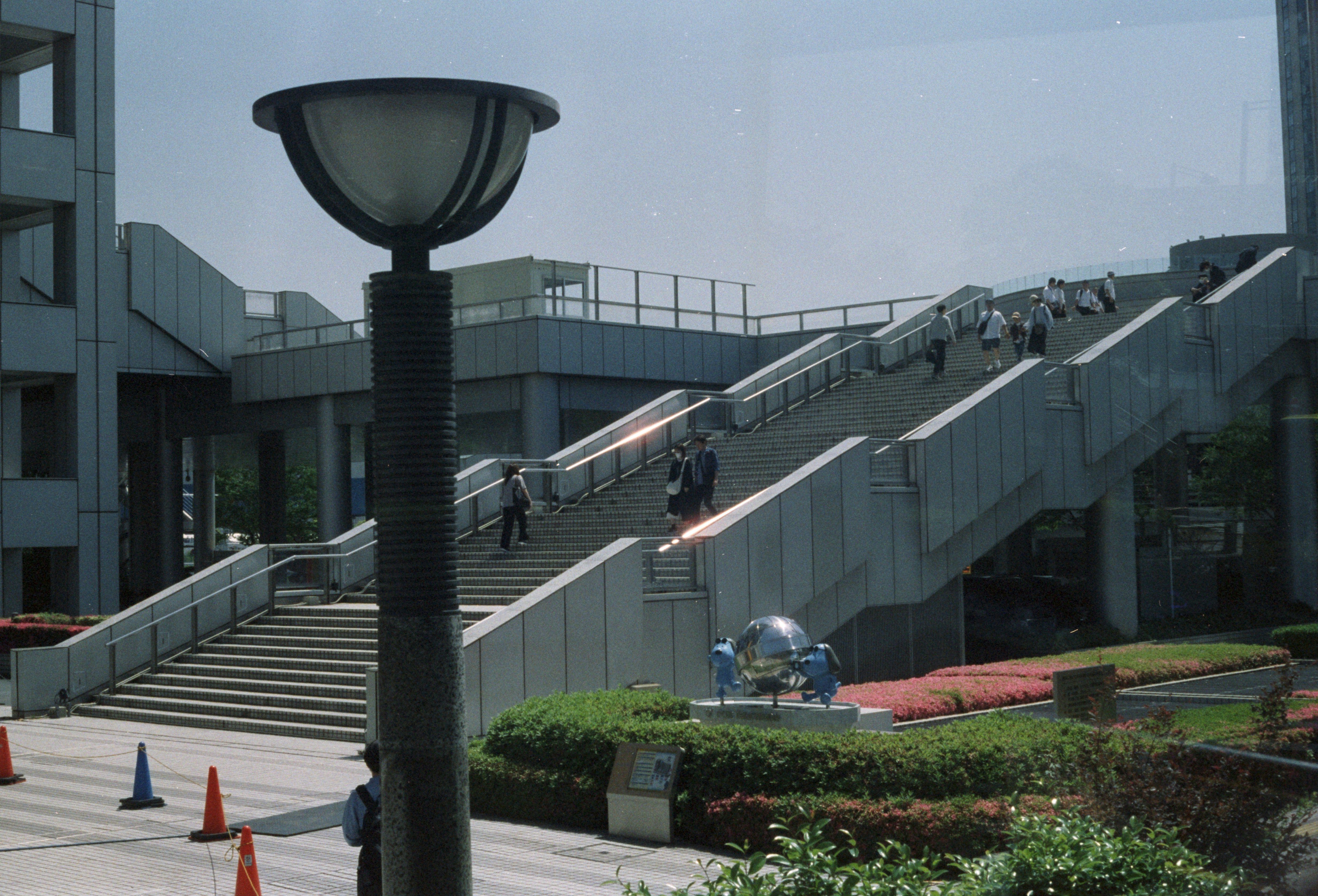 A man riding a skateboard down a set of stairs