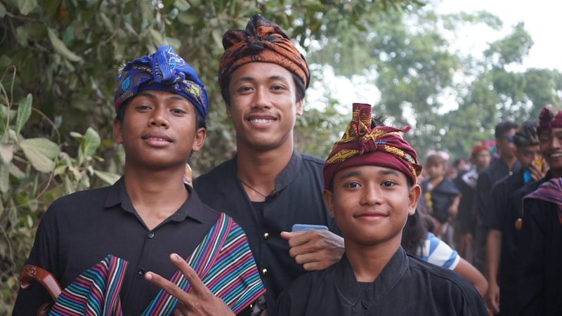 A group of people standing next to each other