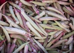 A pile of beans sitting next to each other