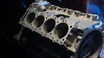 A close up of an engine block on a table