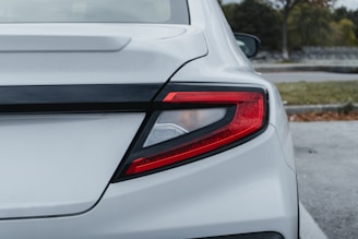 A close up of the tail lights of a car