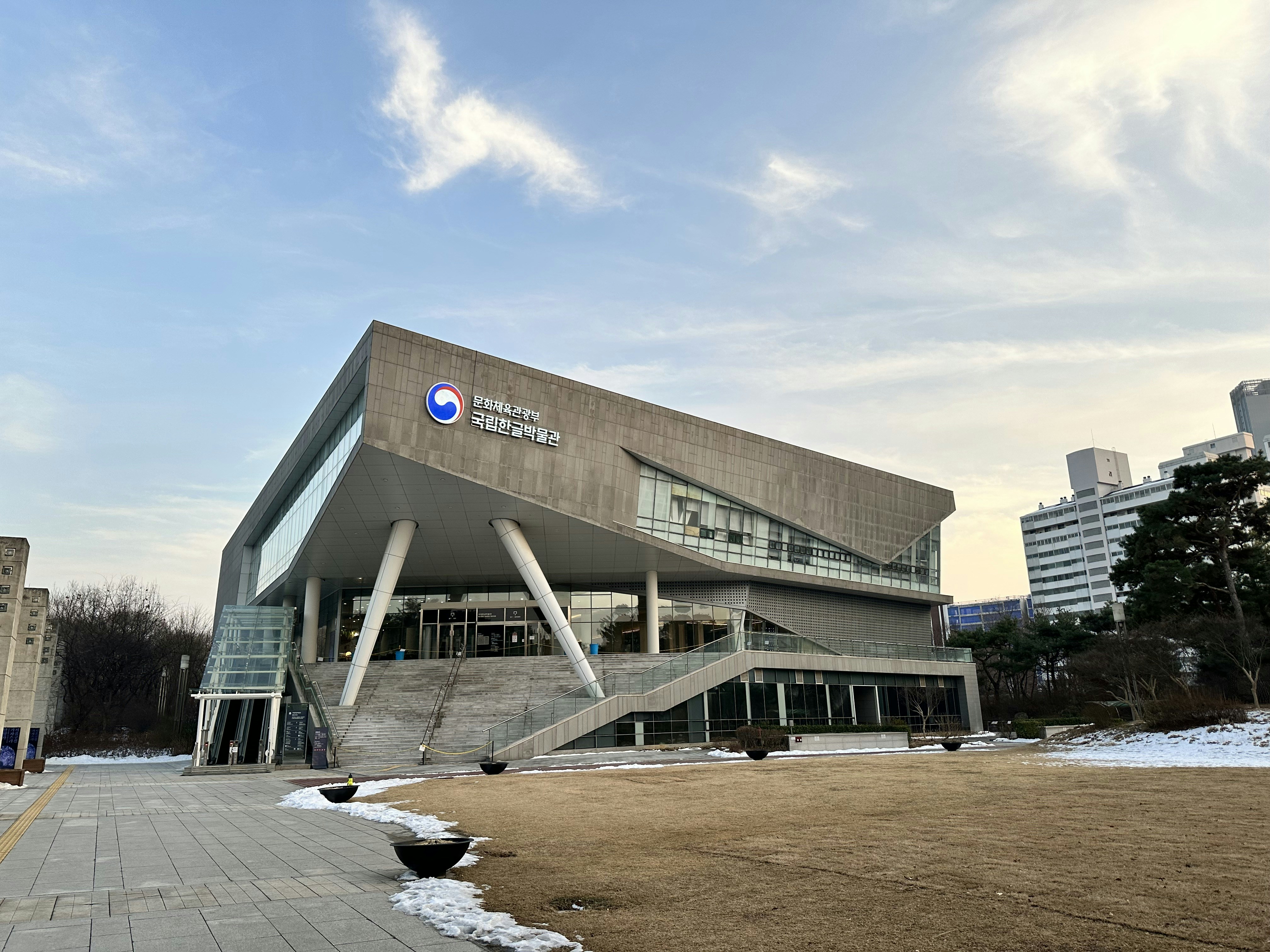 A large building with a staircase leading up to it