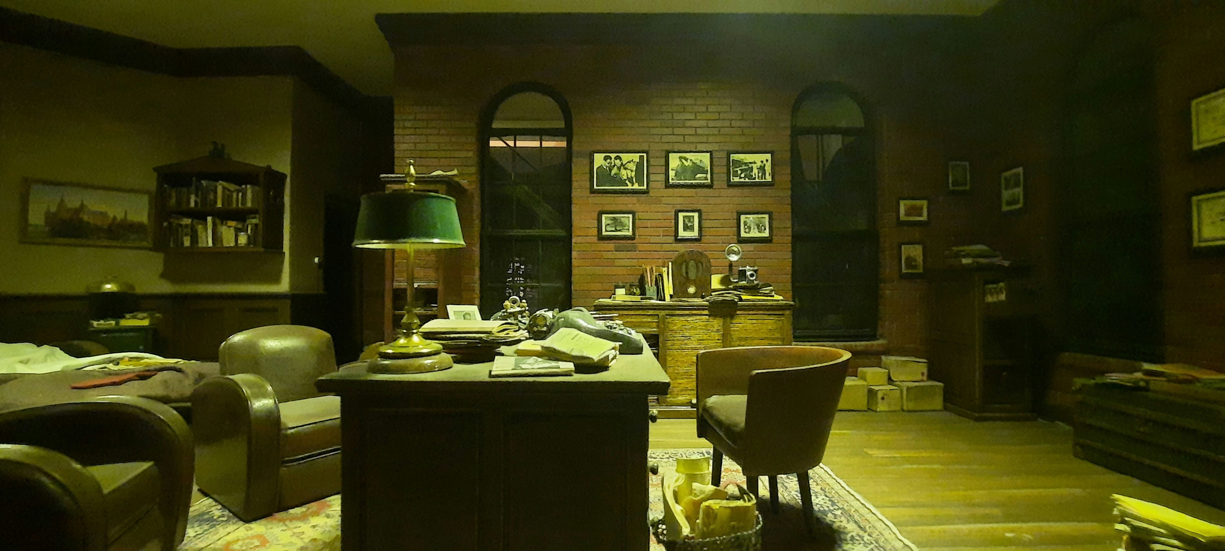 A living room filled with furniture and a fire place