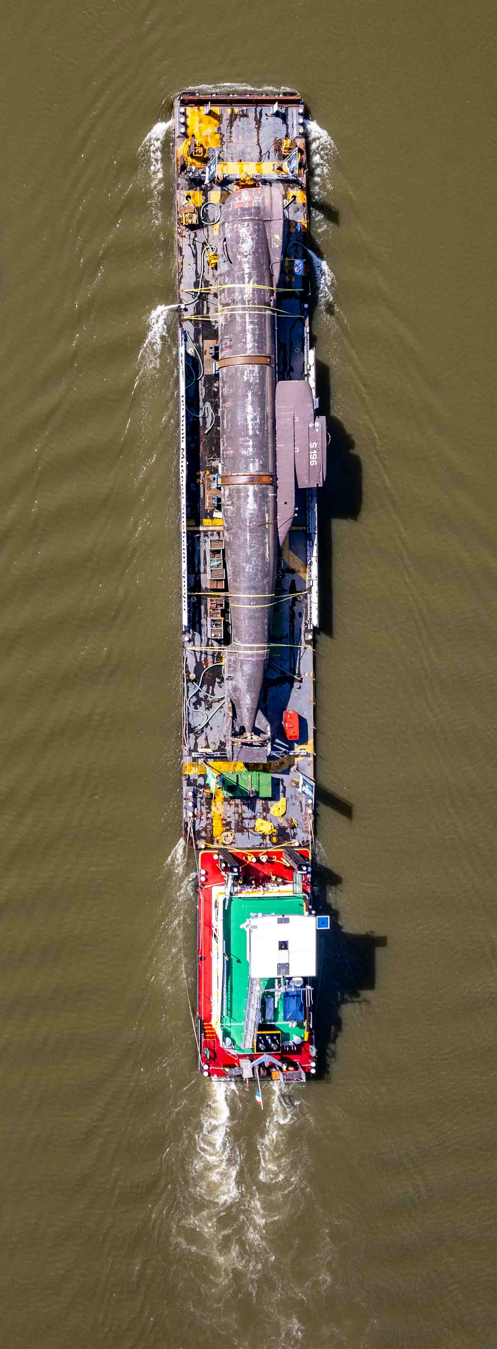 A boat floating on top of a body of water