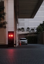 A car is parked in front of a building