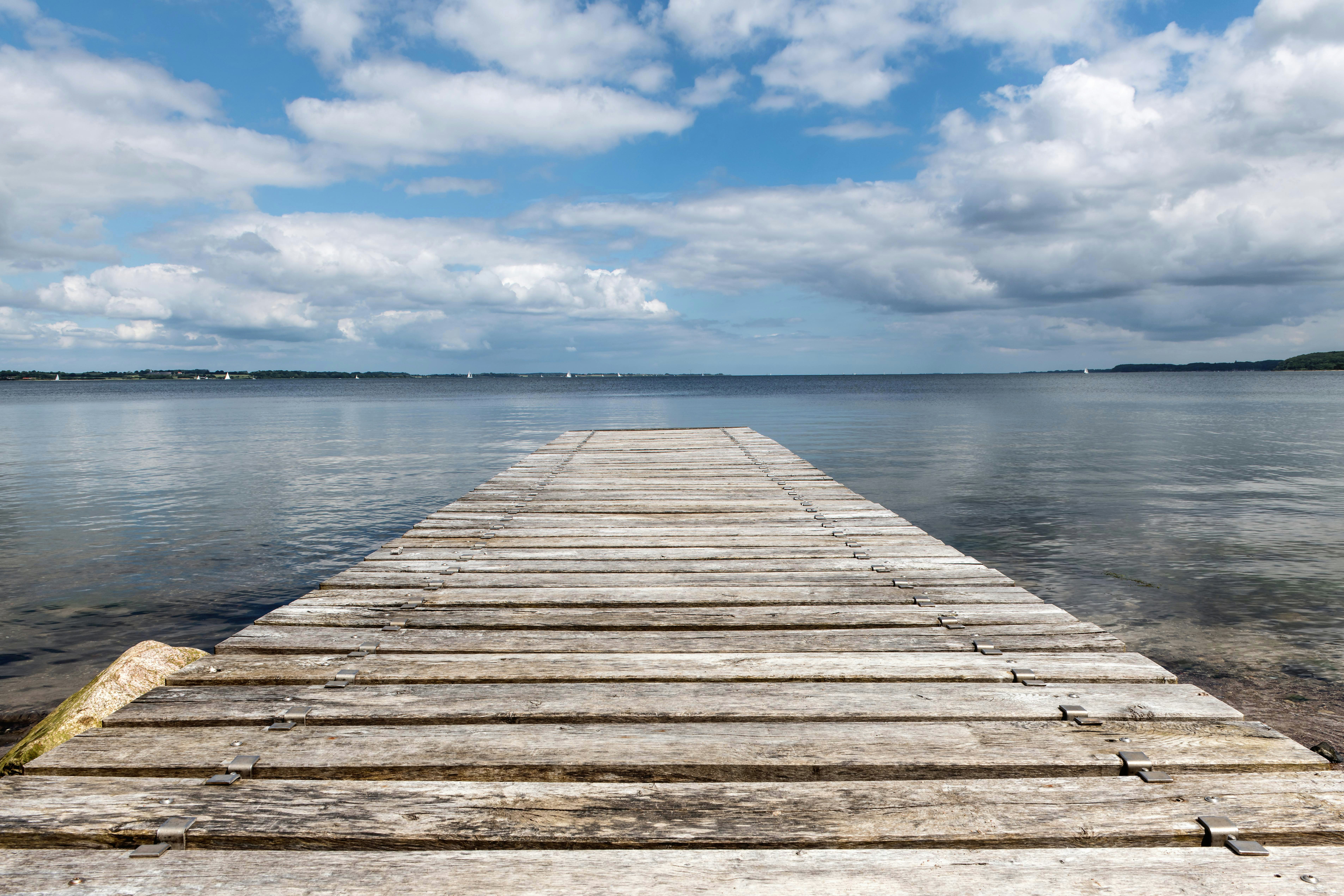 A wooden dock extending into a body of water