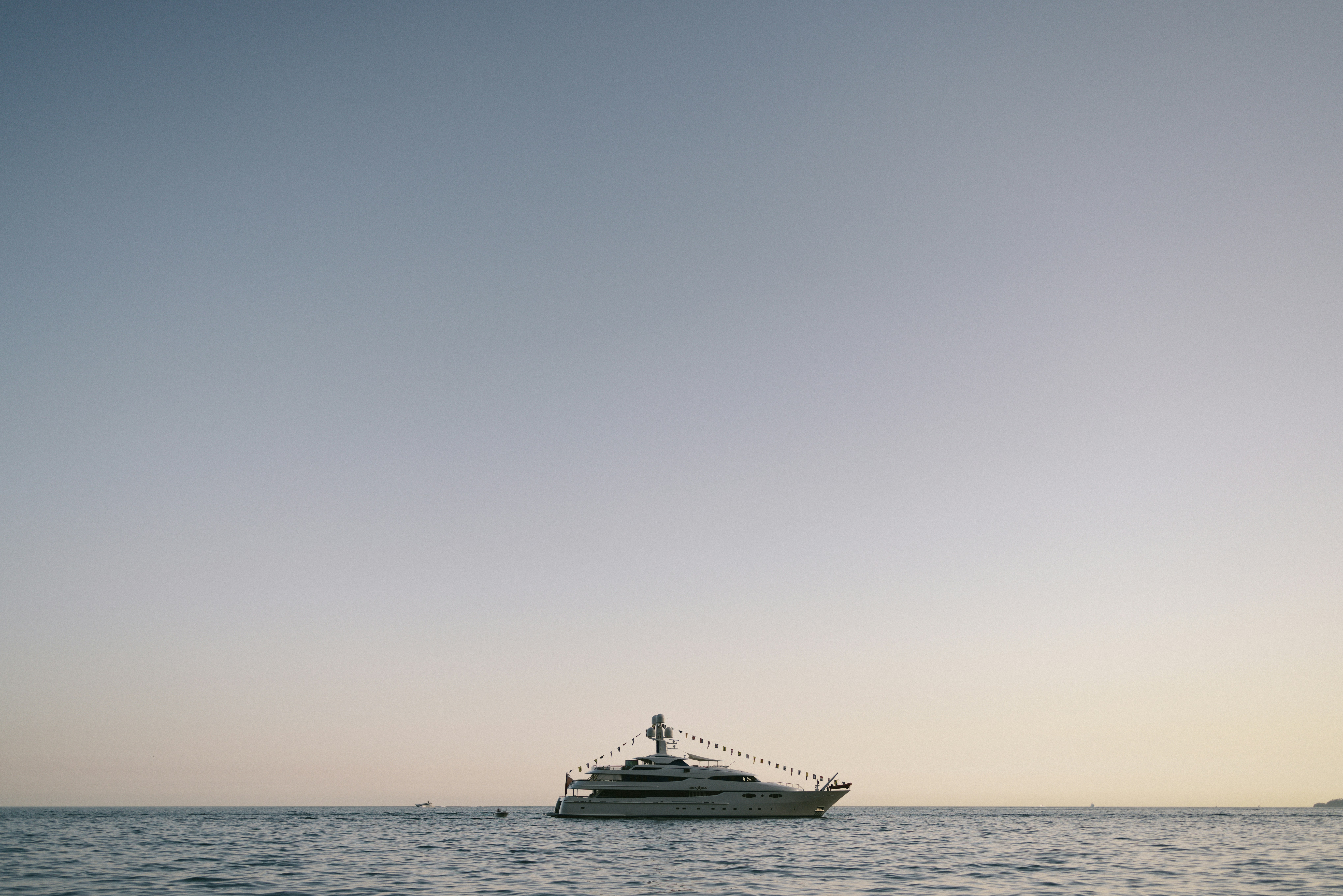 A large boat in the middle of a body of water