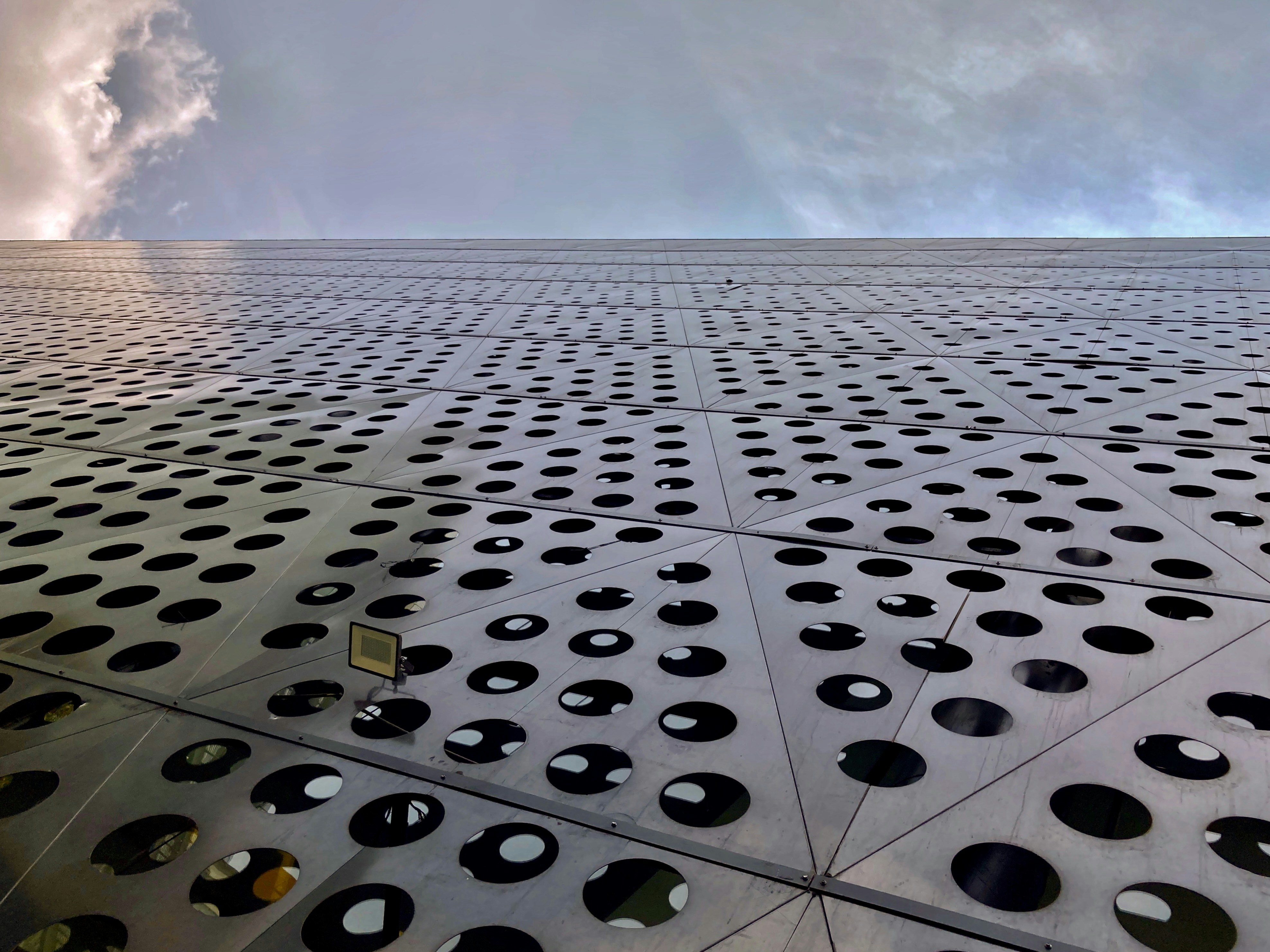 A large metal structure with holes in it