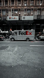 A fed ex truck parked in a parking lot