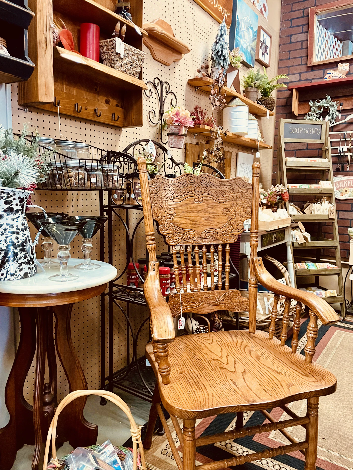 A donated wooden rocking chair and side table