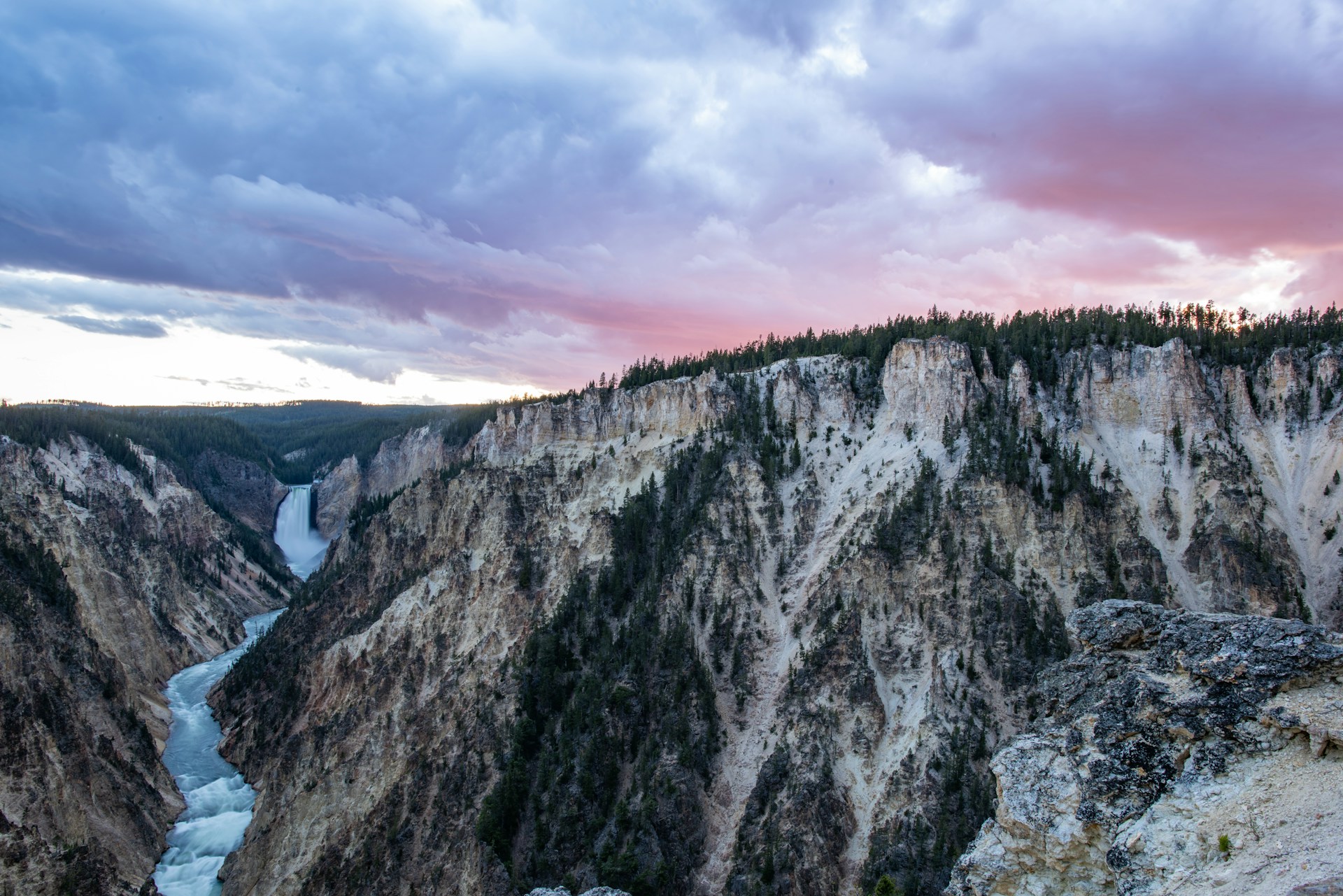 A scenic view of a canyon with a river running through it