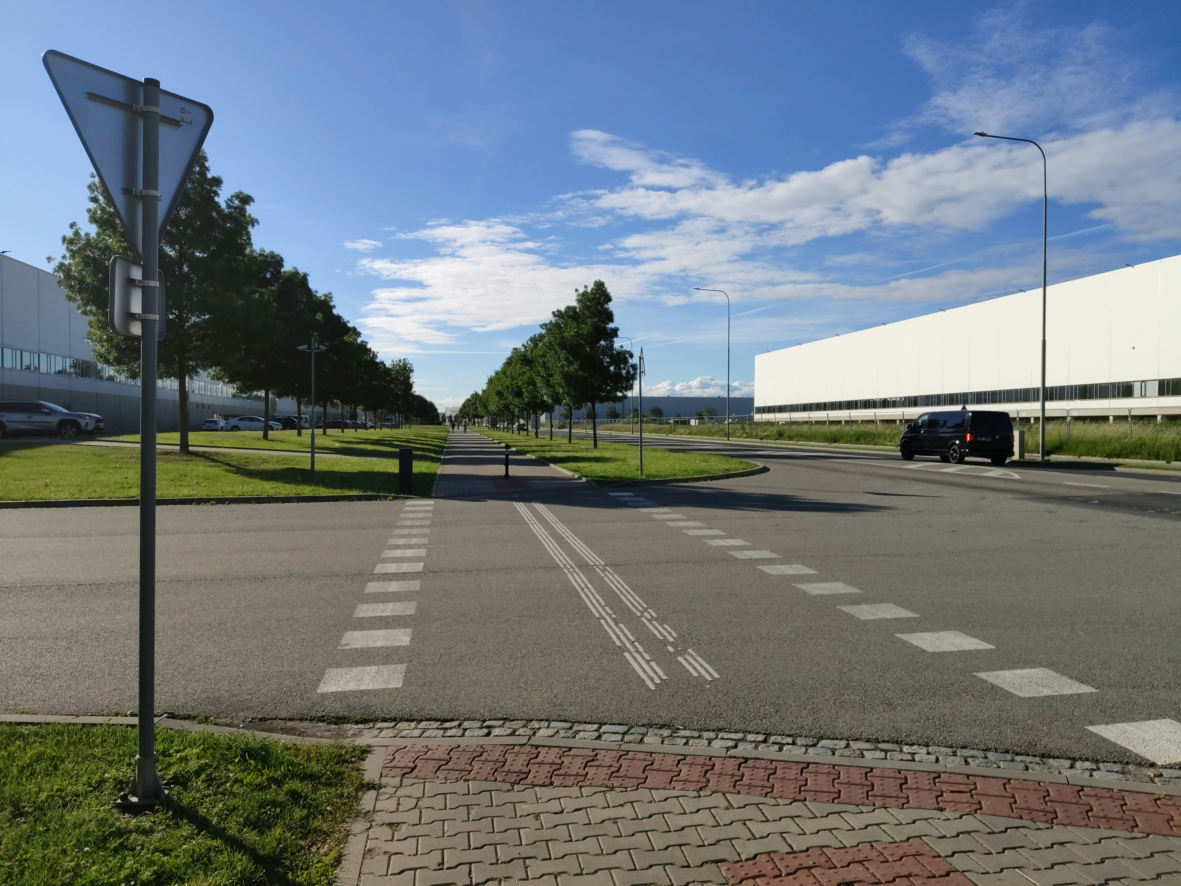 A street sign sitting on the side of a road