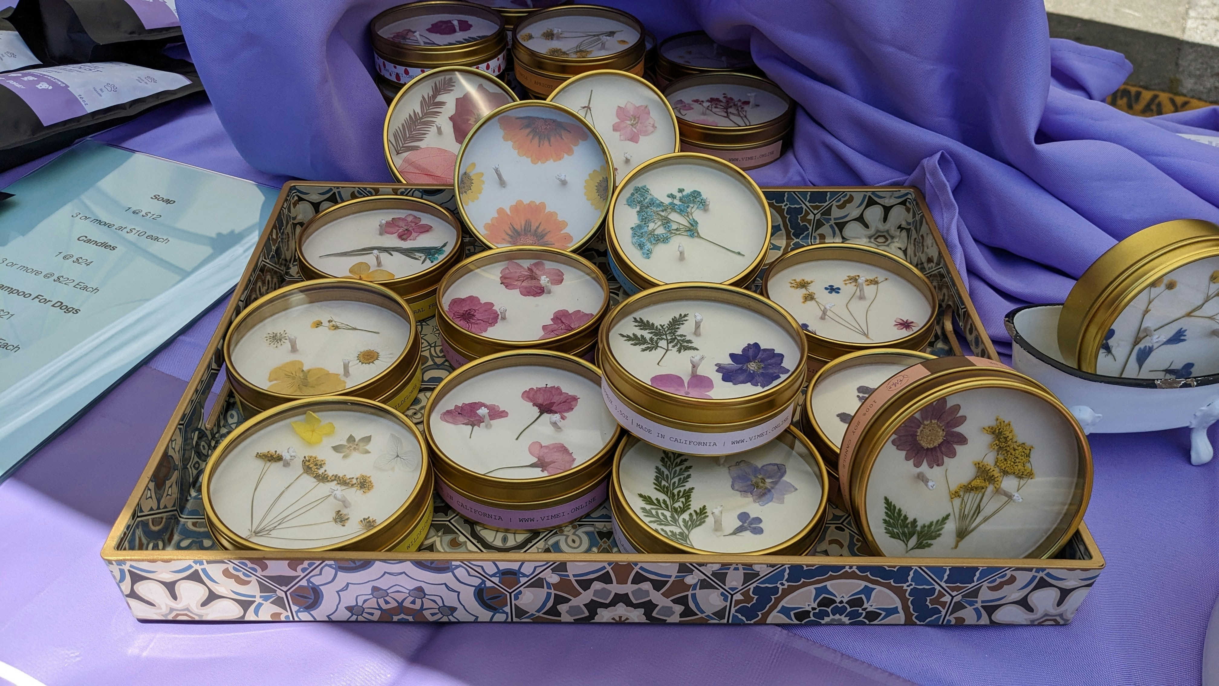 A tray of teacups and plates on a table