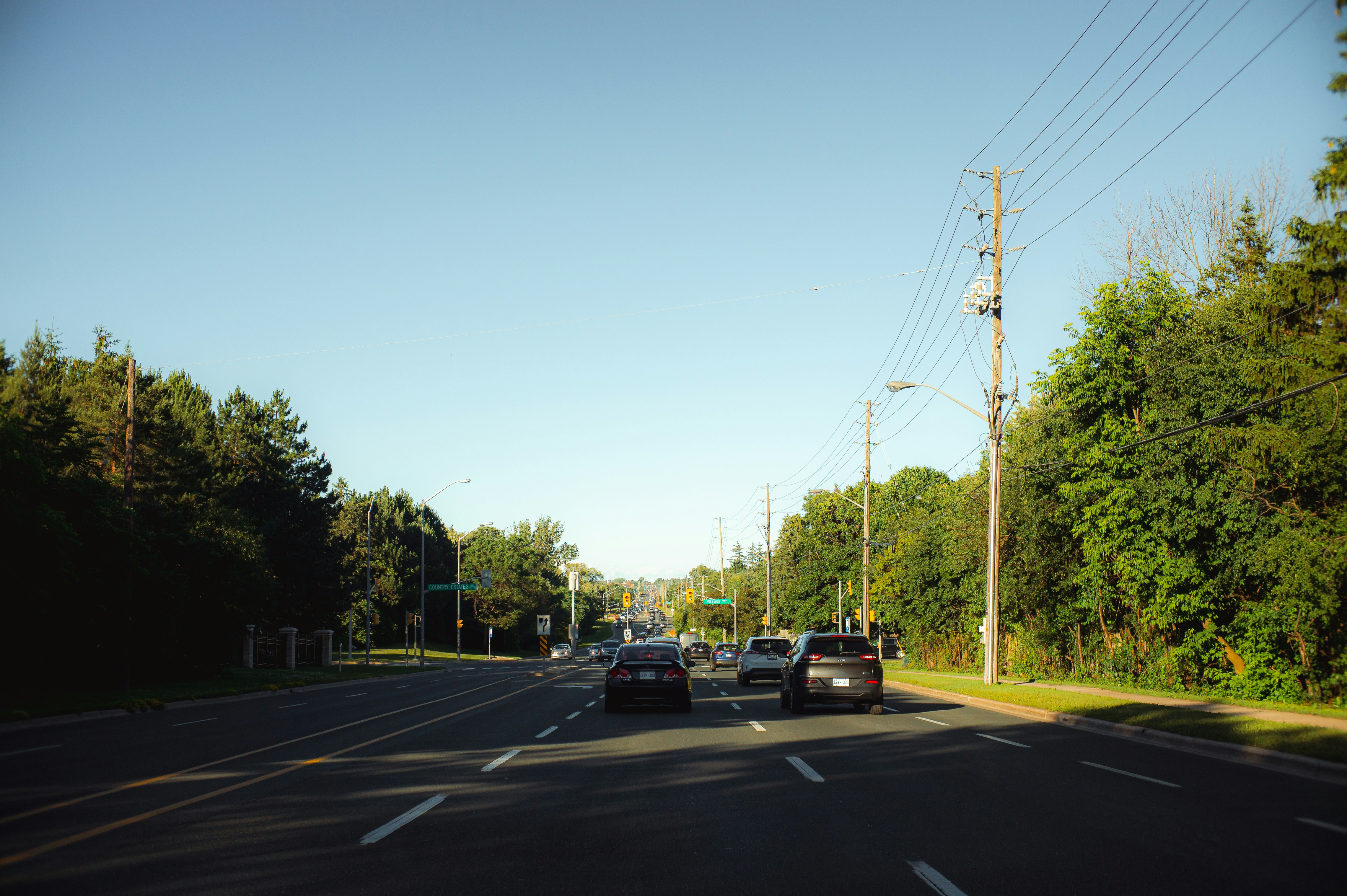 A couple of cars that are sitting in the street