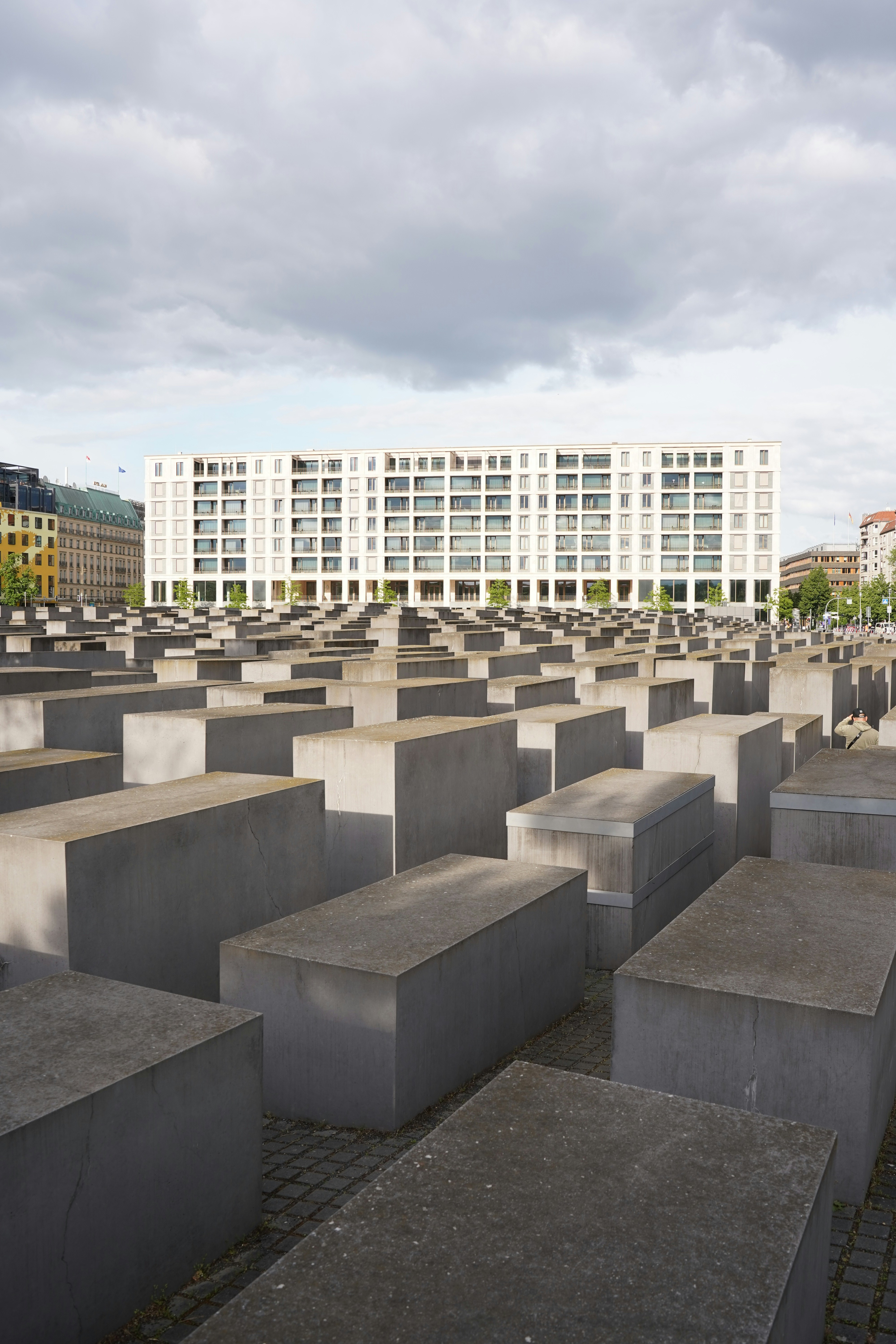 A large group of cement blocks sitting in front of a building