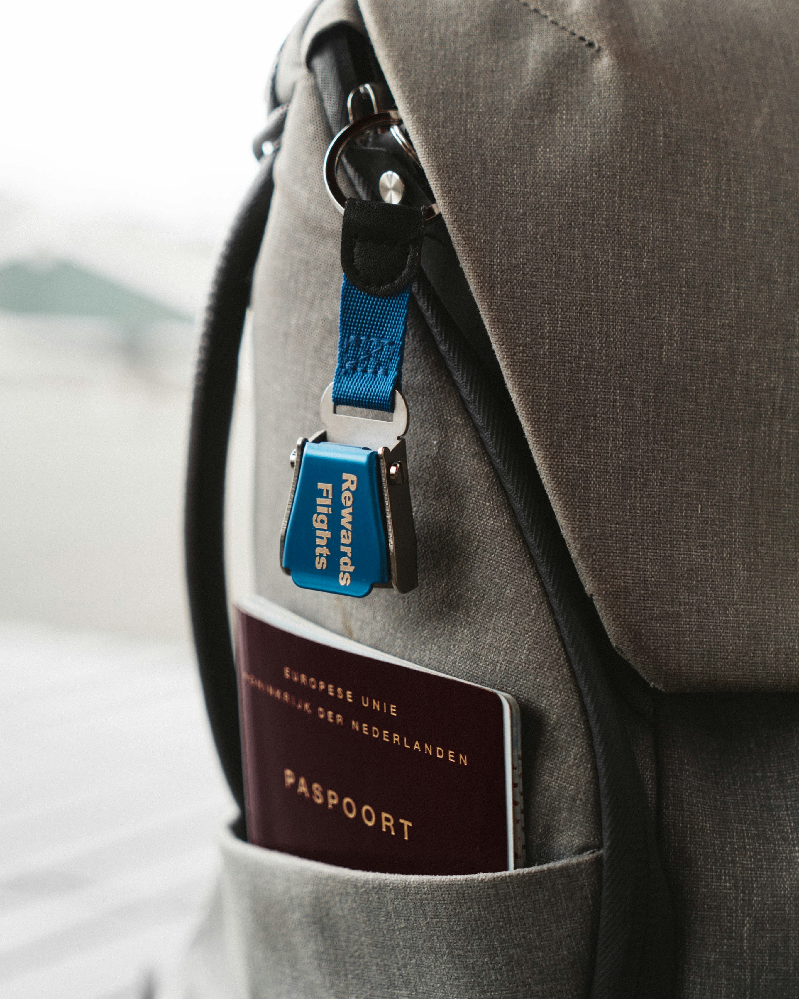 A close up of a backpack with a tag on it