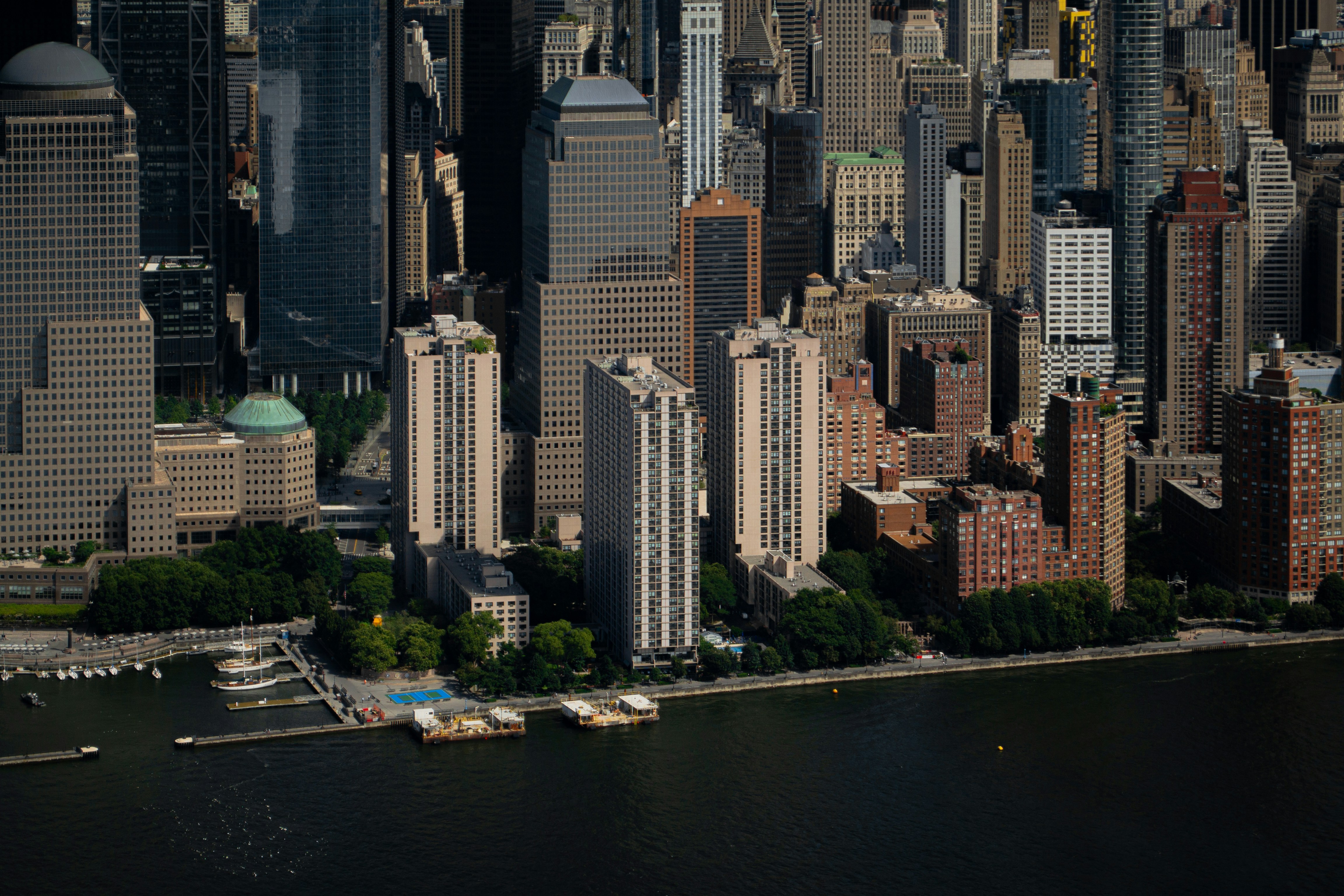 An aerial view of a city with tall buildings, 