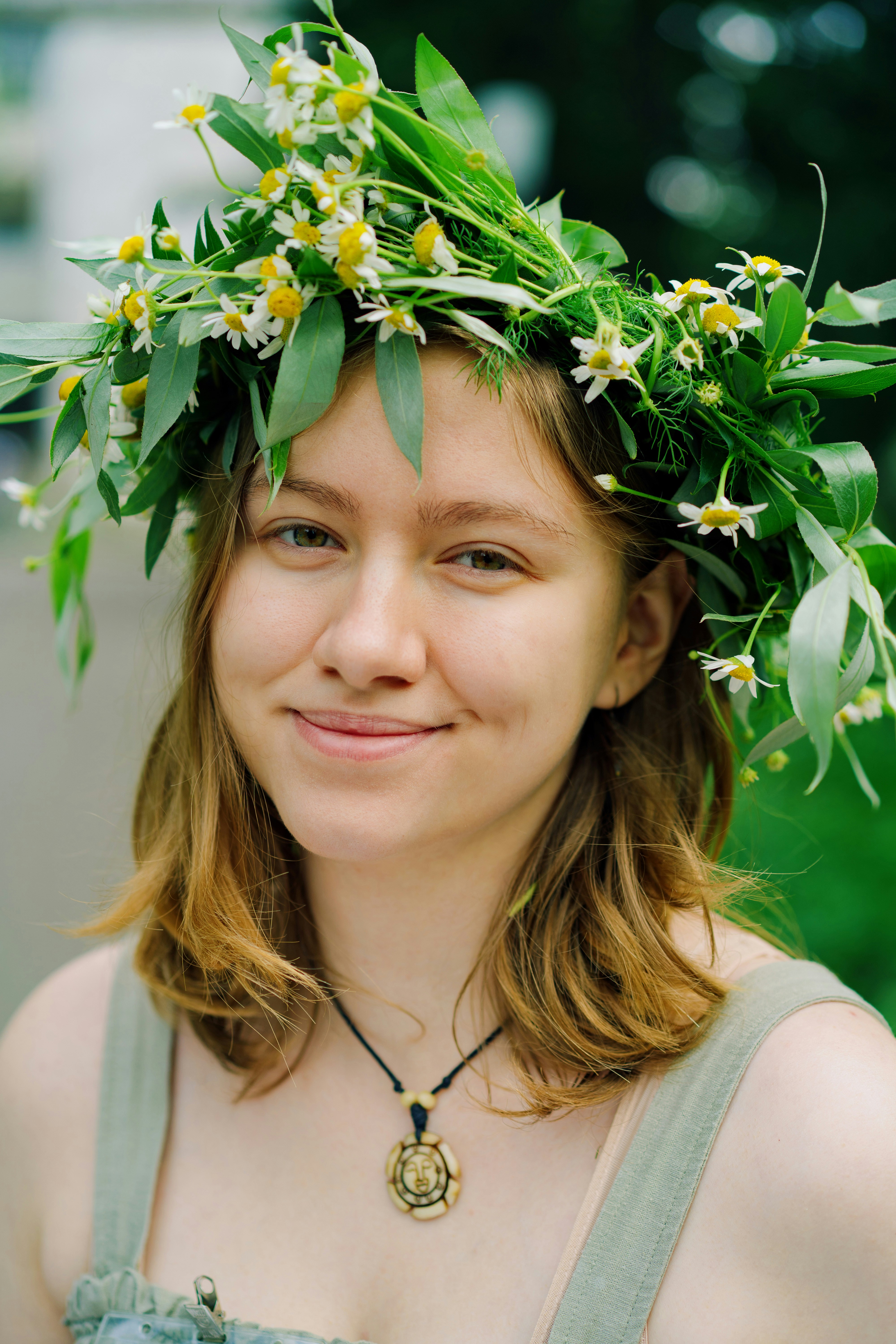 A woman with a flower crown on her head