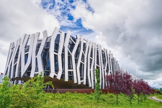 A large building with a lot of windows on top of it