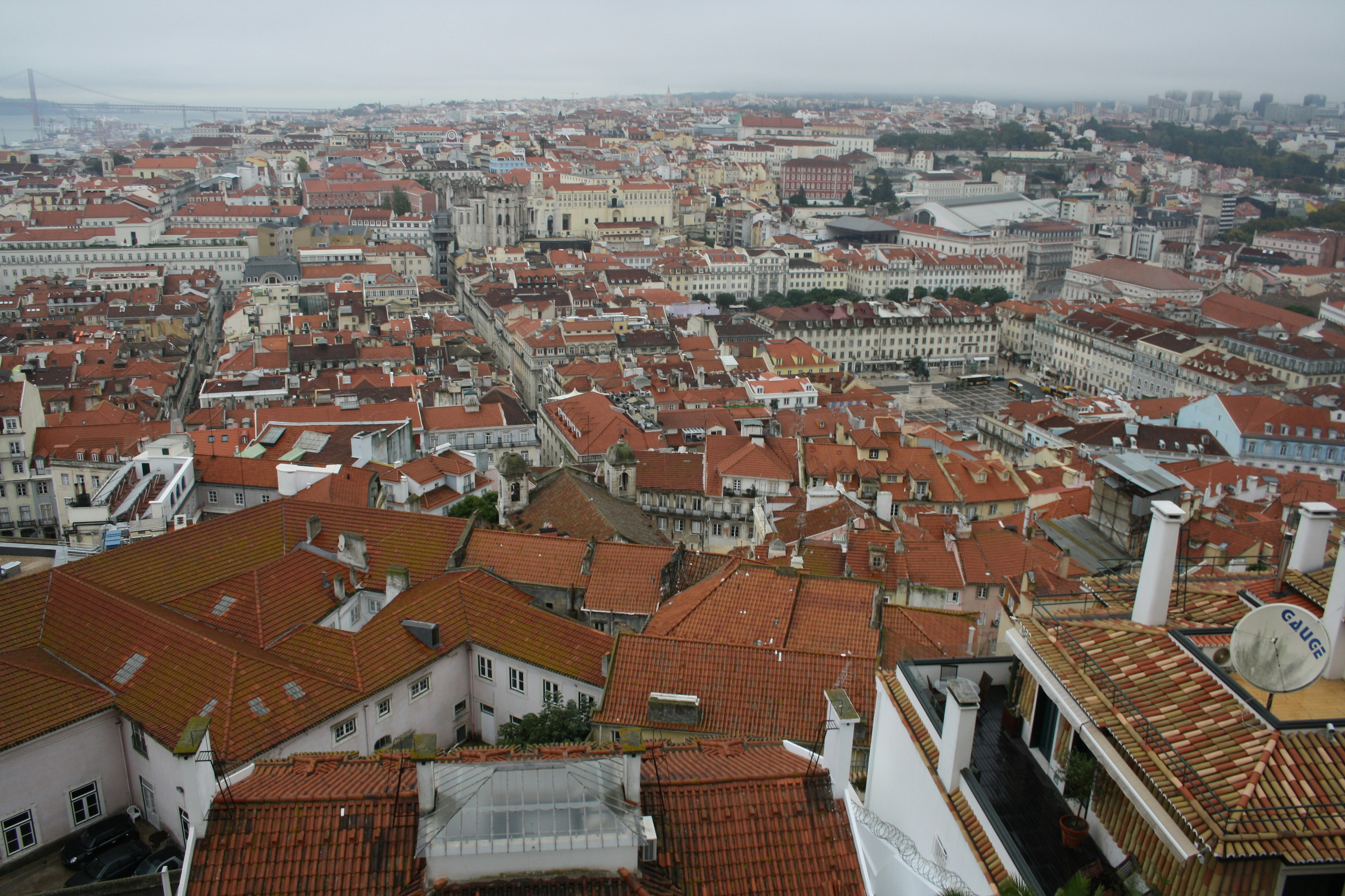 A view of a city from the top of a building