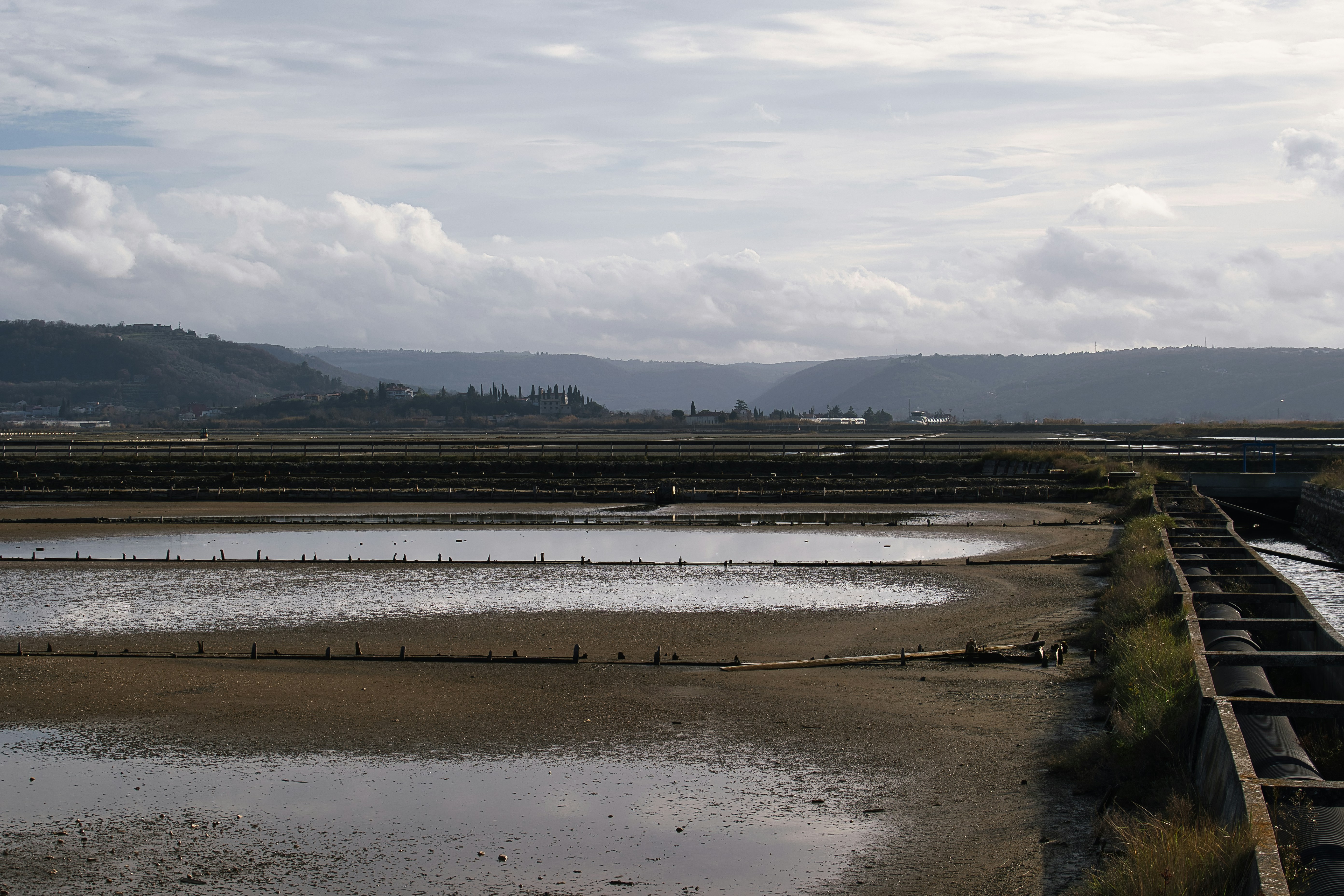 A large body of water sitting next to a beach