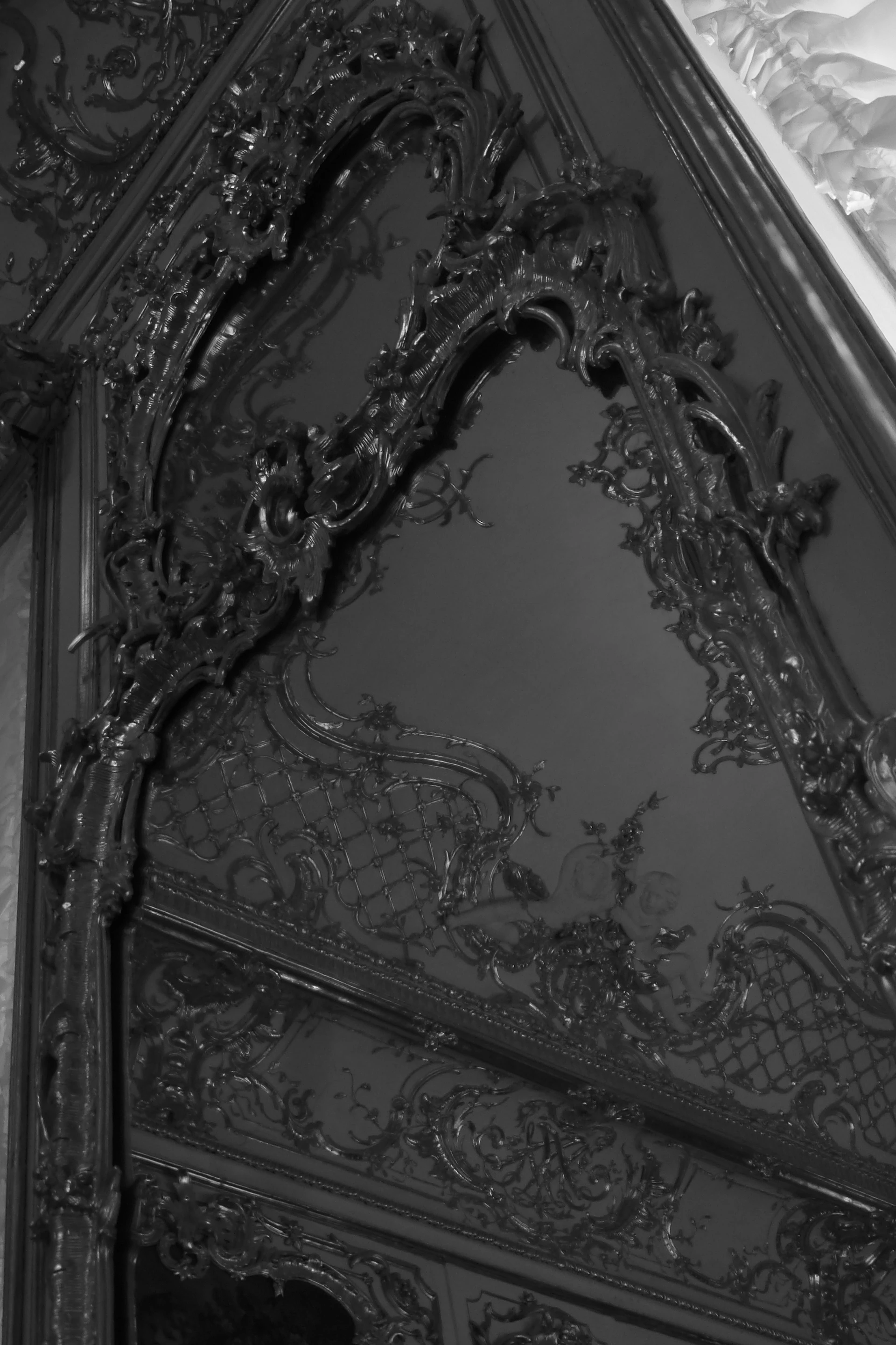 A black and white photo of a mirror