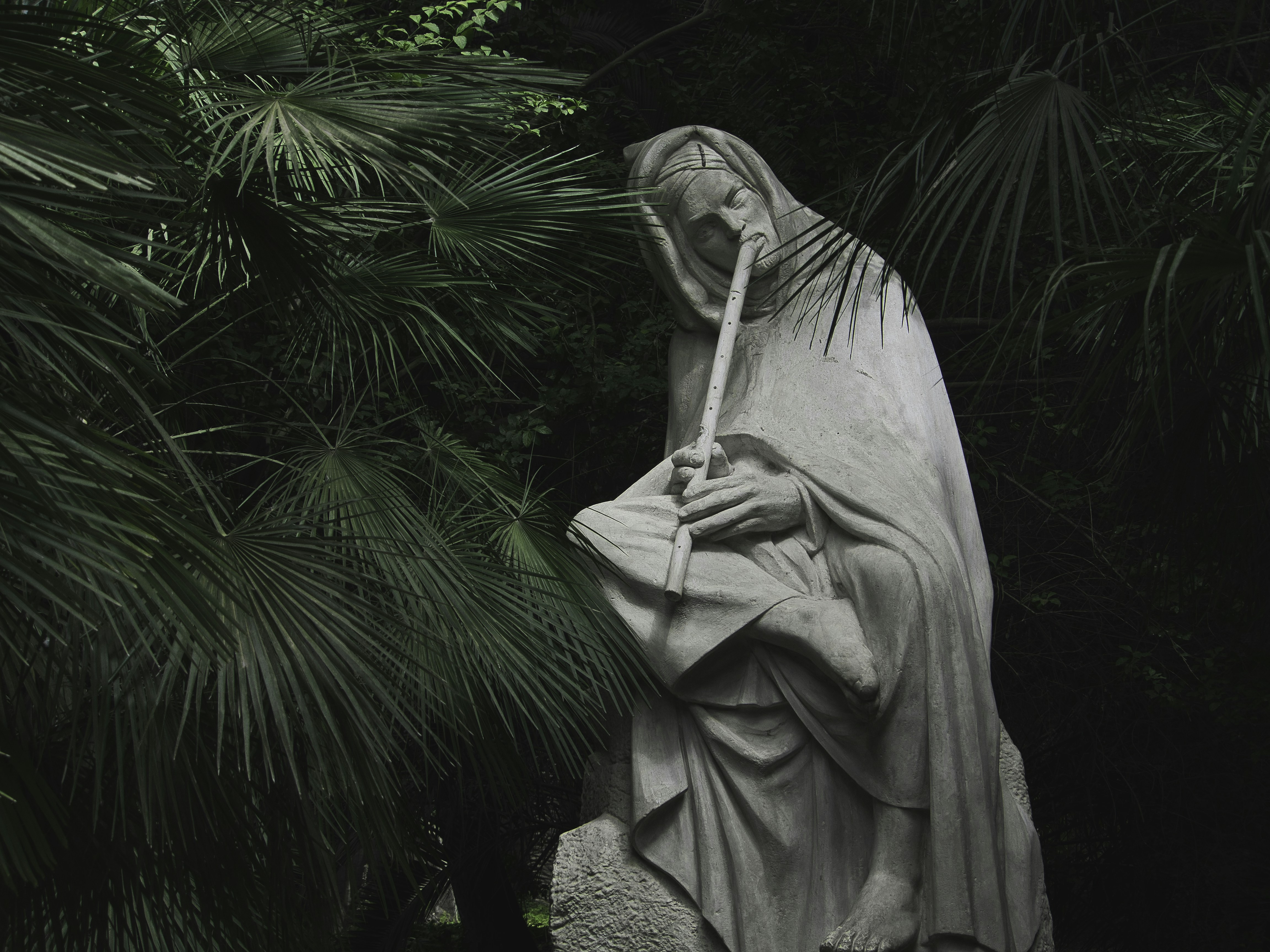 A statue of the virgin mary holding a baby jesus