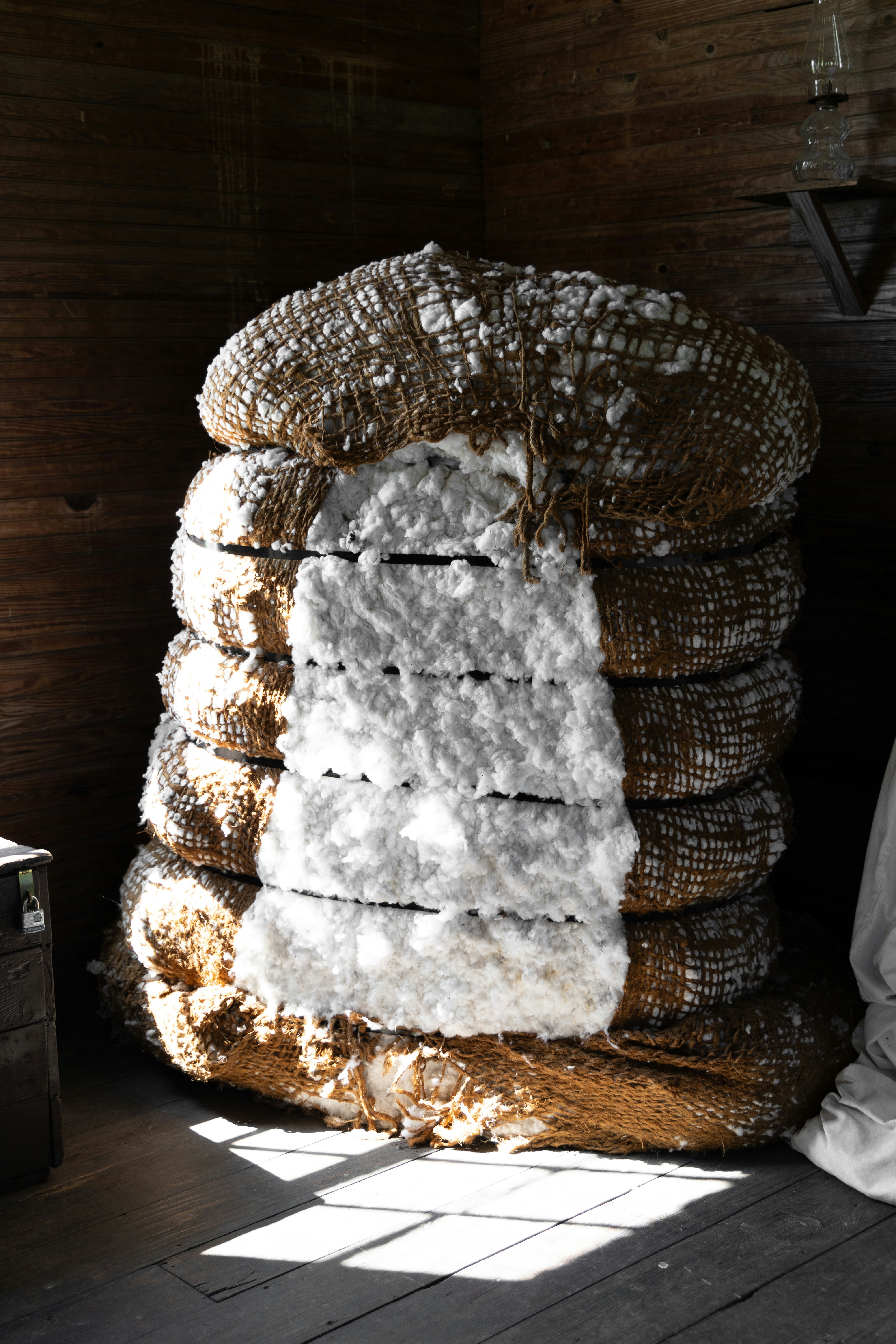 A pile of bread sitting on top of a wooden floor