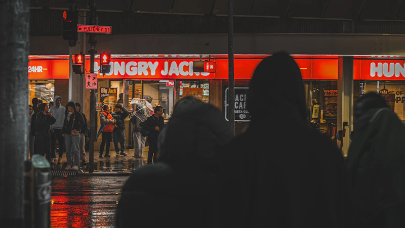 people gathered outside a city store