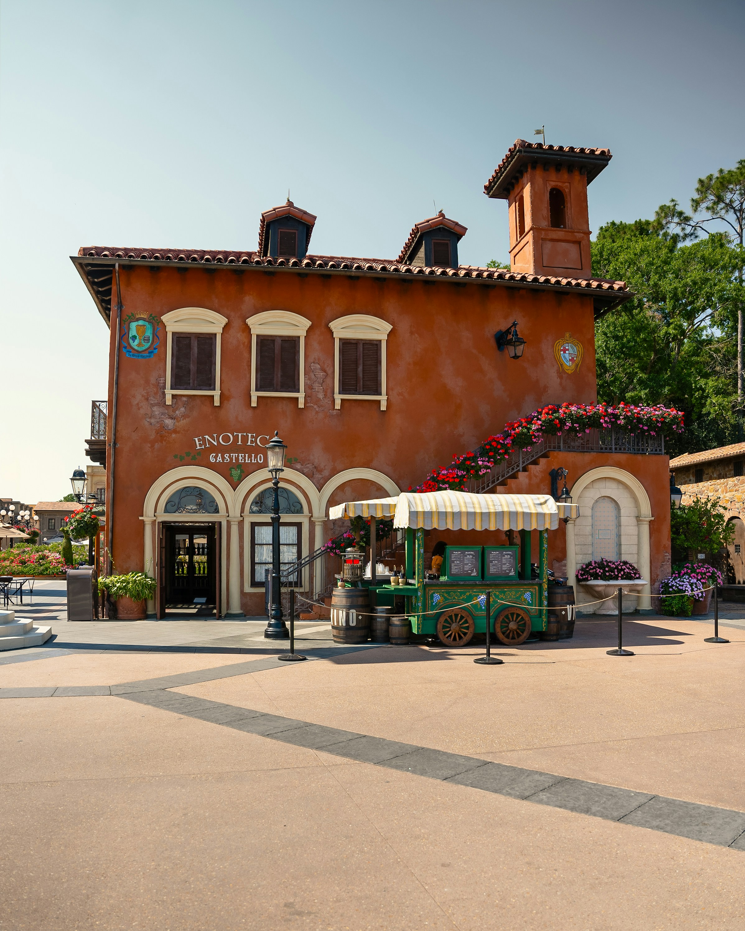 A building with a clock tower on the top of it photo – Free Epcot ...
