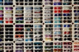 A large display of sunglasses and sunglasses for sale
