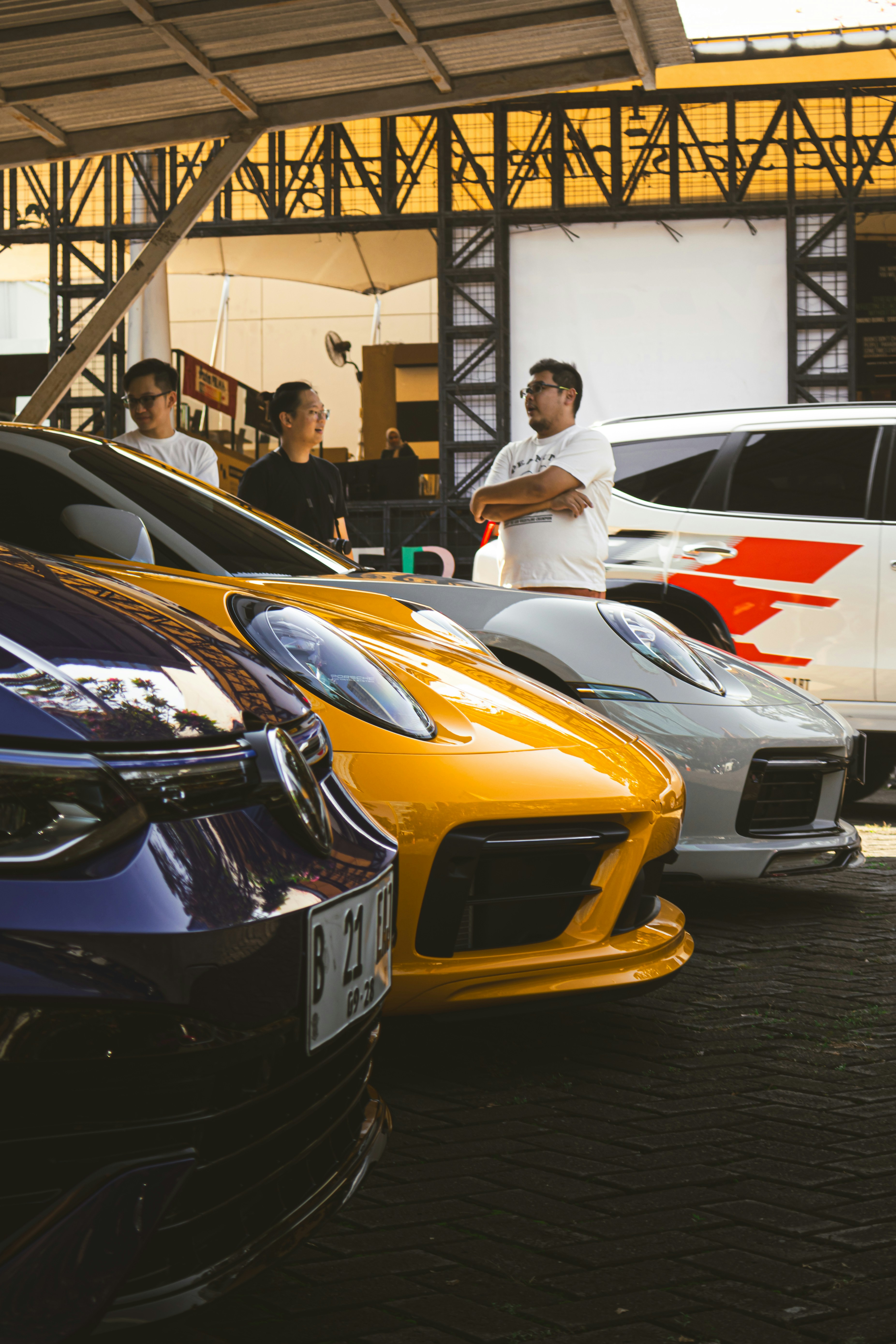 A group of cars parked next to each other