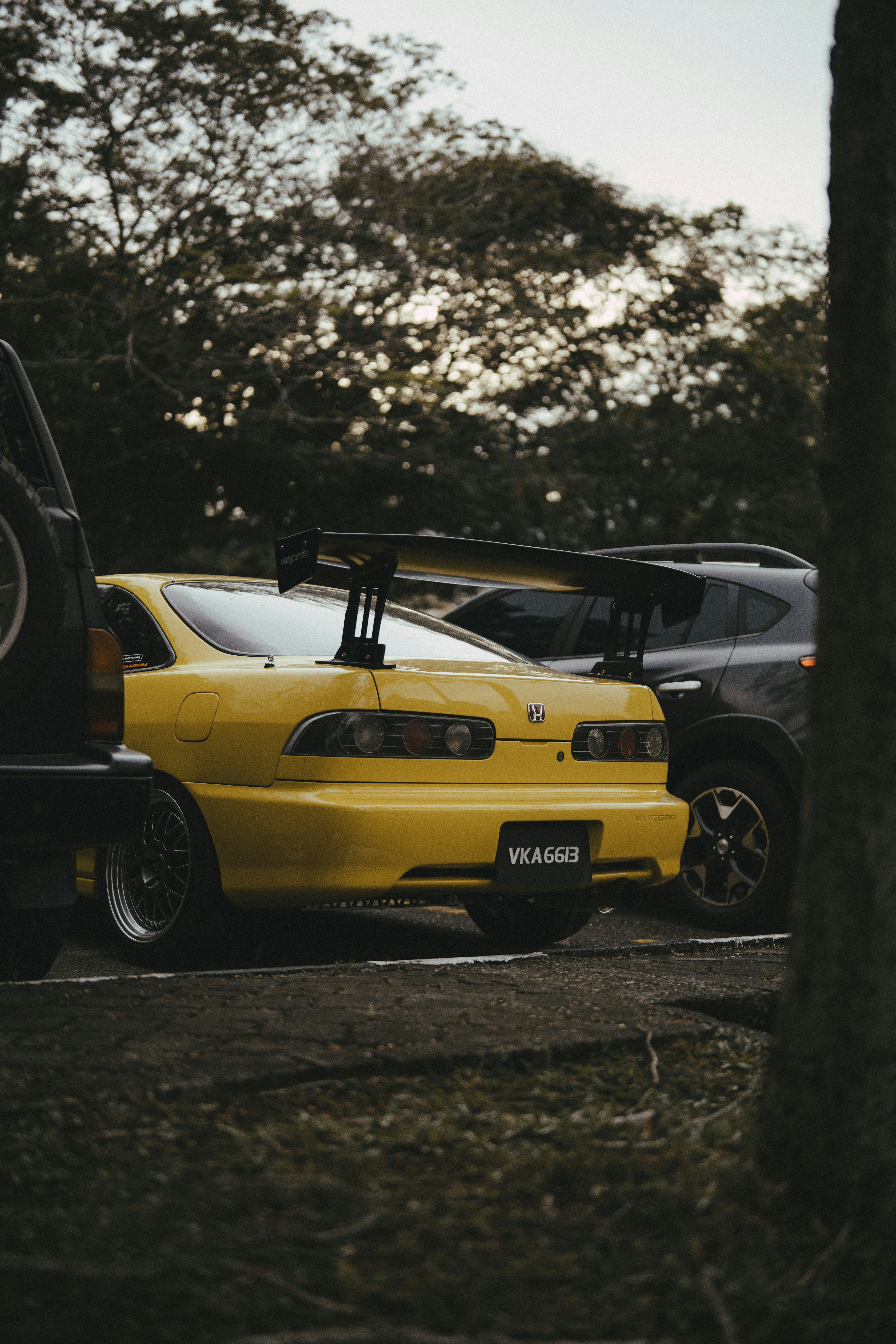 A couple of cars parked next to each other