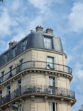 A tall building with balconies and balconies on it