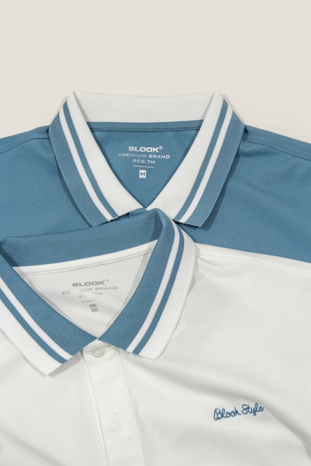 A white and blue polo shirt with a white collar