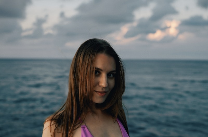 Sexy Egyptian beauty in purple bikini