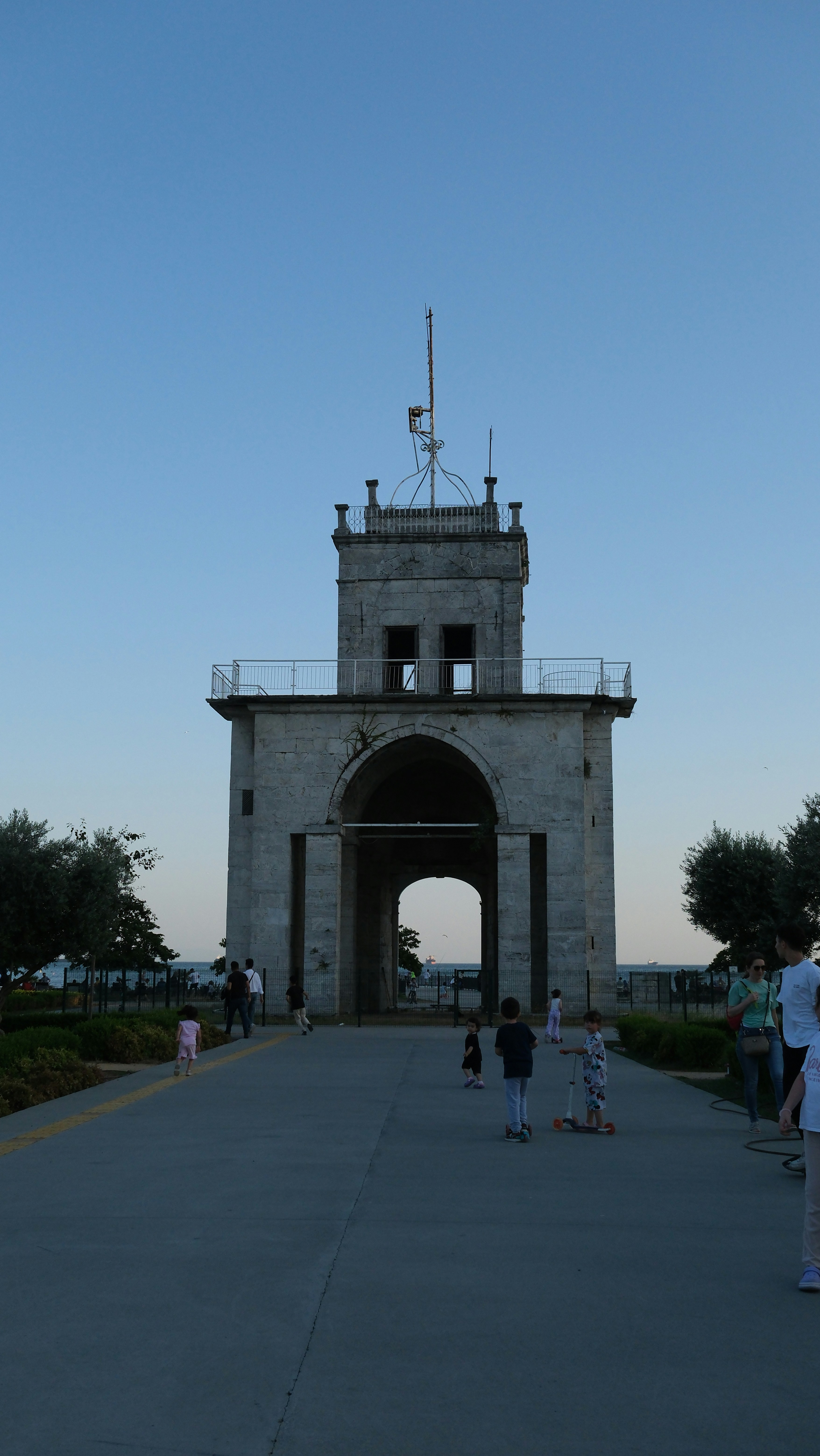 woman wearing yellow long-sleeved dress under white clouds and blue sky during daytime