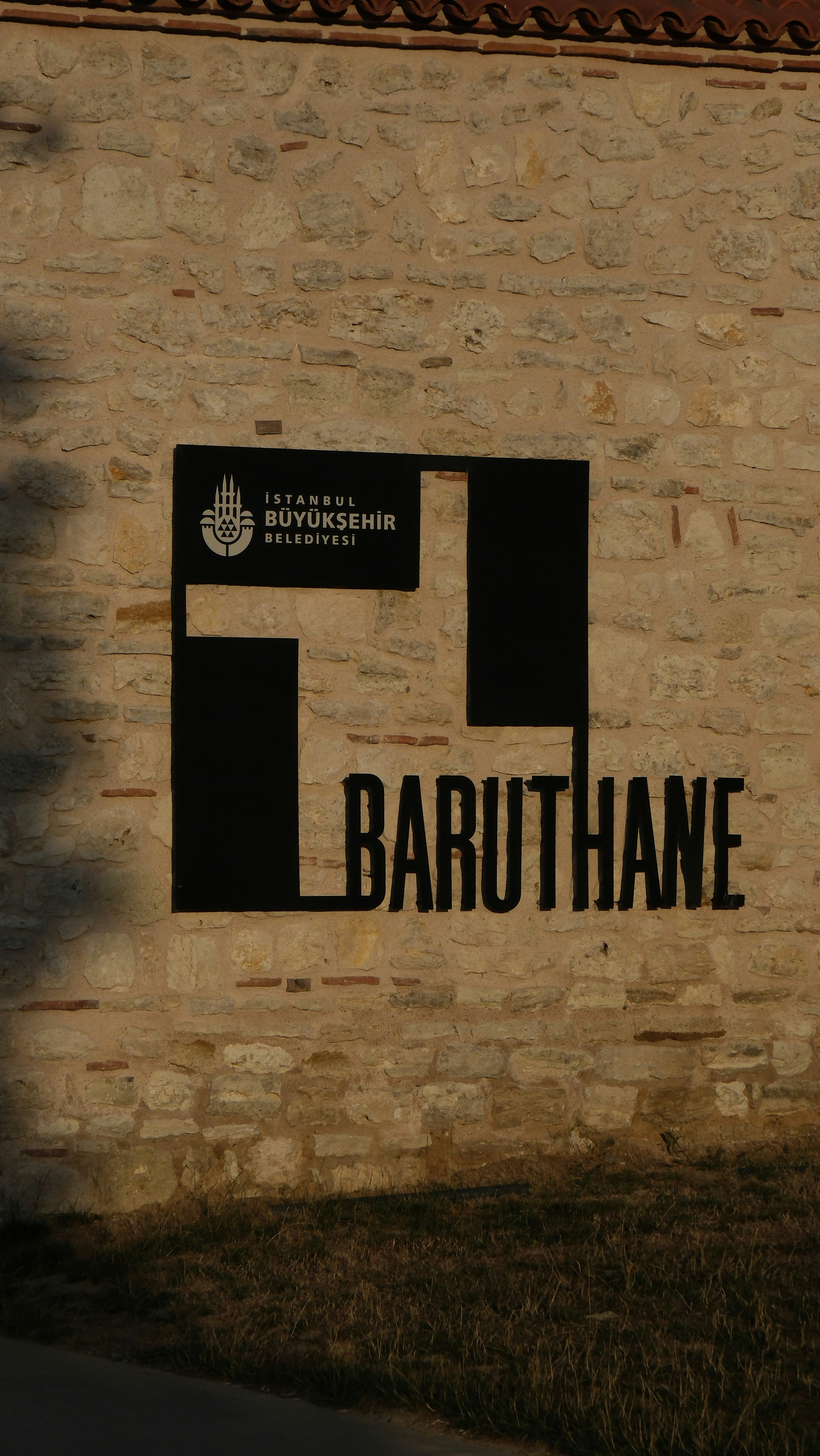 A building with a sign on the side of it