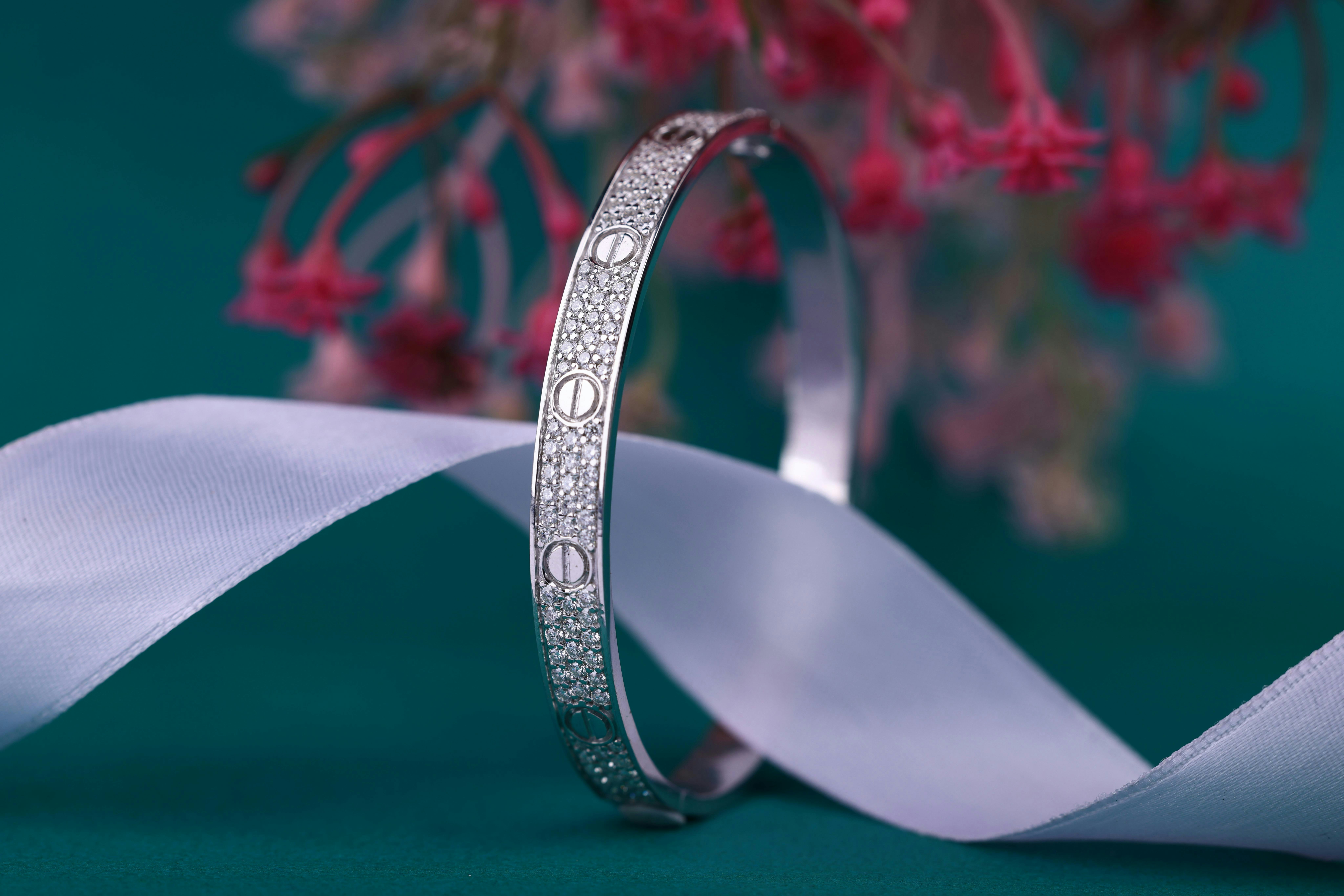 A close up of a wedding ring on a table