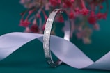 A close up of a wedding ring on a table