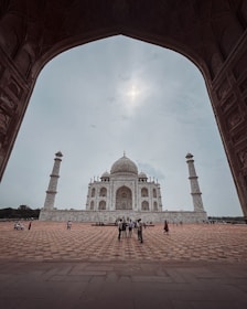 A group of people standing in front of a building