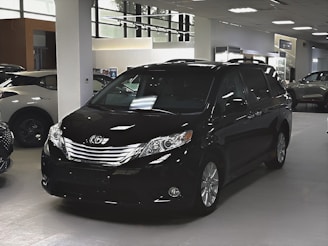 A car showroom filled with lots of cars