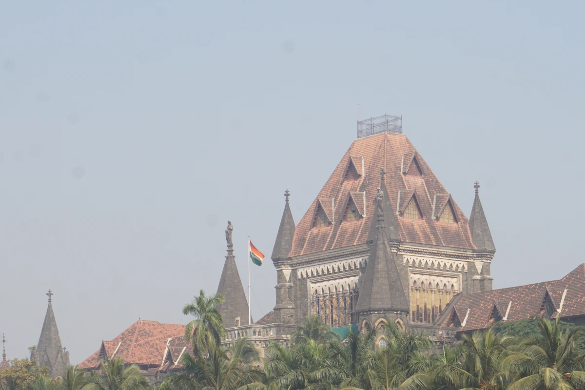 The Bombay High Court building in Fort, Mumbai, with the national flag on its tower