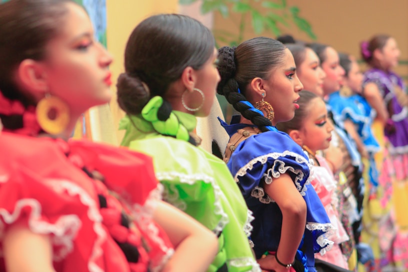 A group of women standing next to each other
